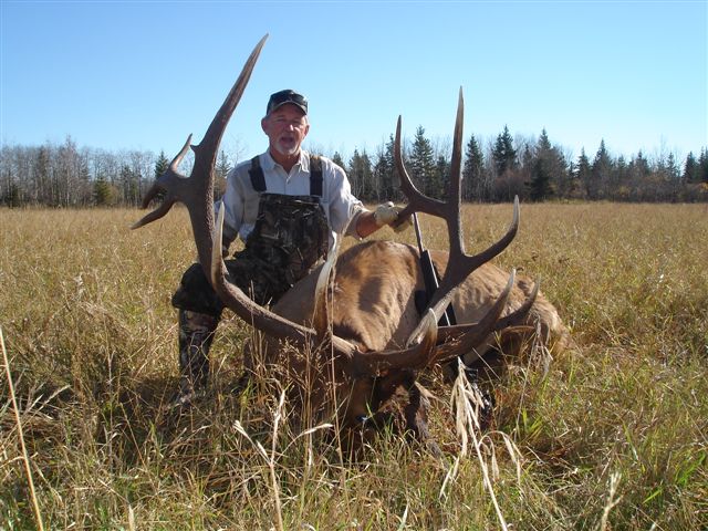 Robin Homman from Texas with trophy bull elk at Echo Lake Hunts in Saskatchewan