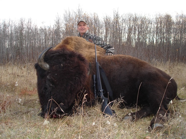 Bob Foreman from Oklahoma with trophy bison at Echo Lake Hunts in Saskatchewan