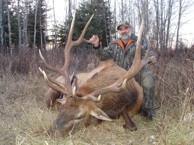 Ed Haines Jr from West Virginia with trophy bull elk at Echo Lake Hunts in Saskatchewan