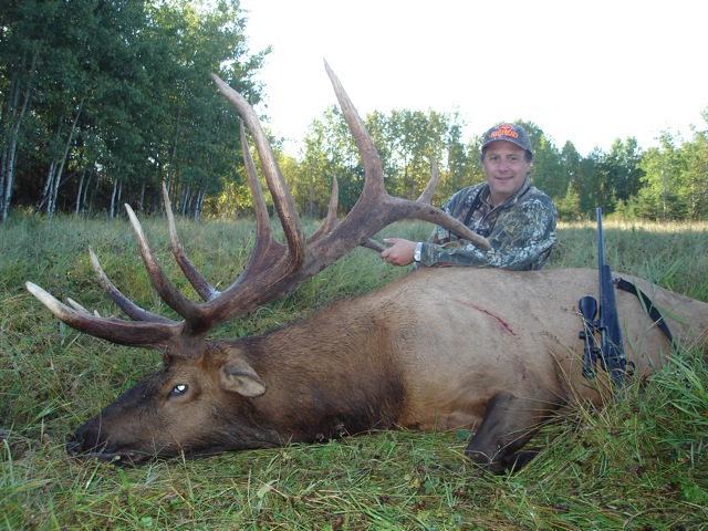 Eduardo Gomez from Mexico with trophy bull elk at Echo Lake Hunts in Saskatchewan