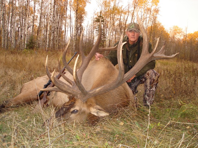 Jim Hutchison from Texas with trophy bull elk at Echo Lake Hunts in Saskatchewan