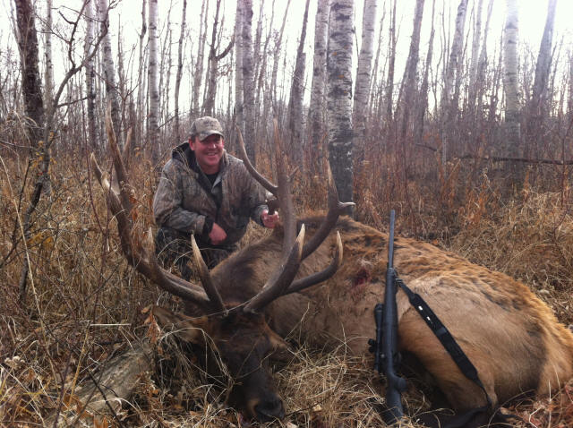 Keith Like from Texas with trophy bull elk at Echo Lake Hunts in Saskatchewan