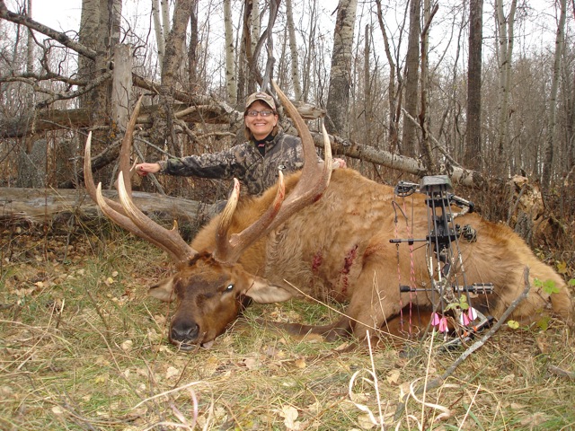 Mary Decker from Minnesota with trophy bull elk at Echo Lake Hunts in Saskatchewan