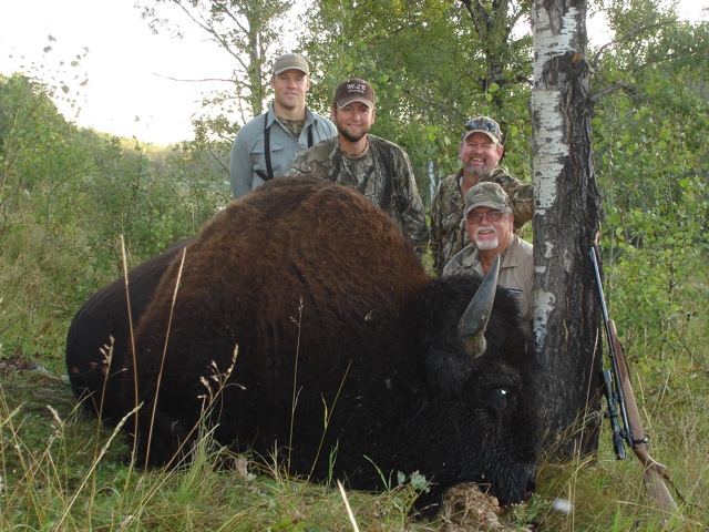 With a big bison while elk hunting in Saskatchewan Canada