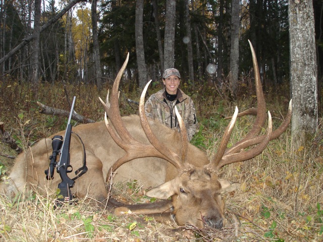 Annie Buck from Oklahoma with trophy bull elk at Echo Lake Hunts in Saskatchewan