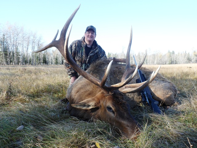 Greg Jeffries from Minnesota with trophy bull elk at Echo Lake Hunts in Saskatchewan