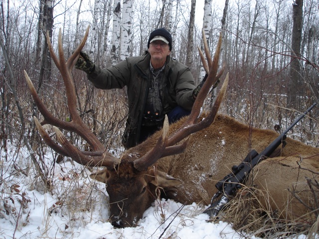 Jim Schubert from Texas with trophy bull elk at Echo Lake Hunts in Saskatchewan