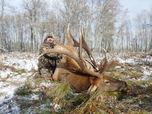 Scott Harlan from West Virginia with trophy bull elk at Echo Lake Hunts in Saskatchewan