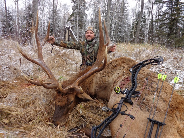 Eric Maclarty from Texas with trophy bull elk at Echo Lake Hunts in Saskatchewan