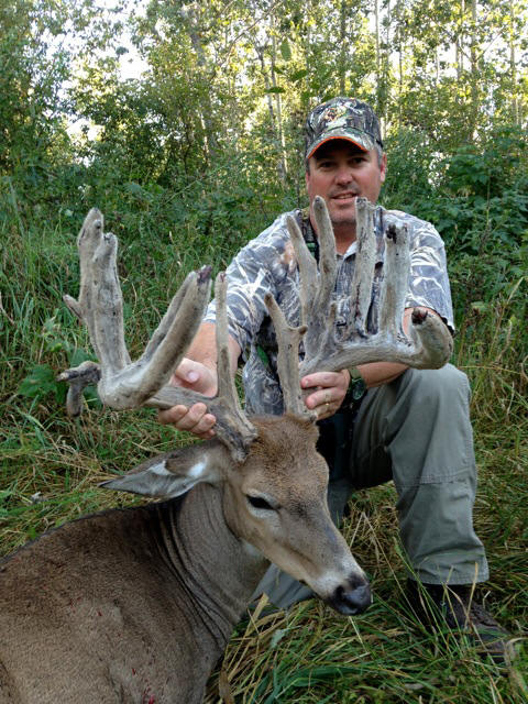 John Hughes from Texas with trophy deer at Echo Lake Hunts in Saskatchewan