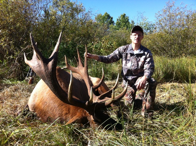 Mark Smith from Texas with trophy bull elk at Echo Lake Hunts in Saskatchewan