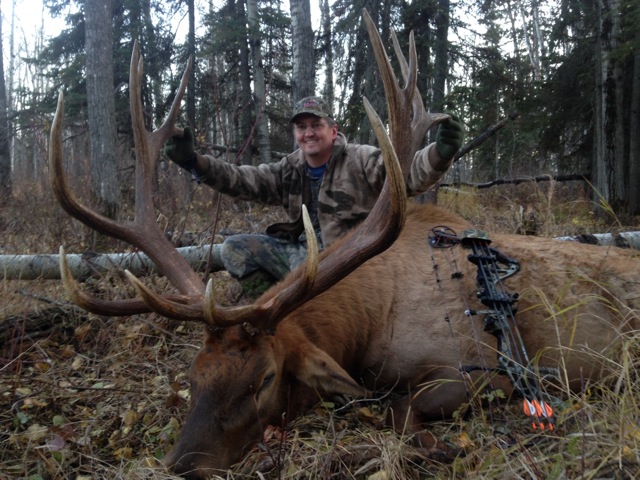 Mike Johnson from Texas with trophy bull elk at Echo Lake Hunts in Saskatchewan