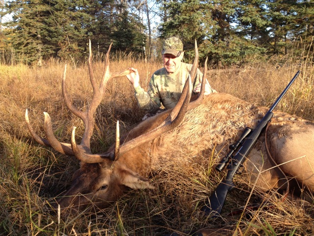 Ray Ingalls from Idaho with trophy bull elk at Echo Lake Hunts in Saskatchewan