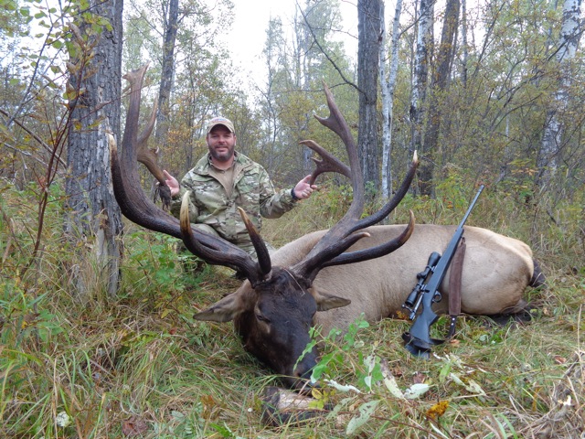 Brian Foster from Texas with trophy bull elk at Echo Lake Hunts in Saskatchewan