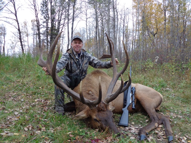 Jay Young from Texas with trophy bull elk at Echo Lake Hunts in Saskatchewan