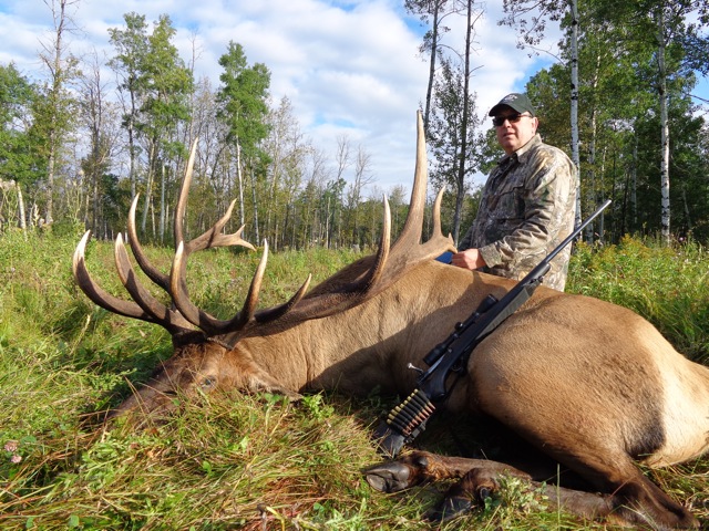 Jim Keith from British Columbia with trophy bull elk at Echo Lake Hunts in Saskatchewan