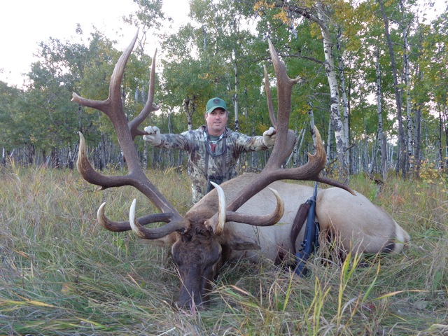 John Hughes from Texas with trophy bull elk at Echo Lake Hunts in Saskatchewan