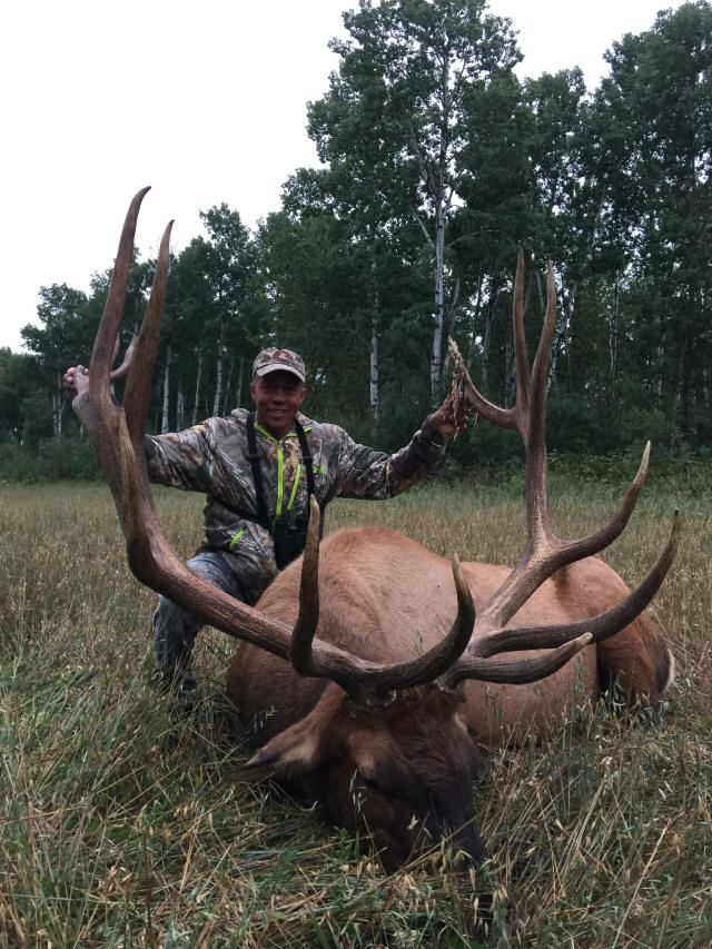 Charles Williams from California with trophy bull elk at Echo Lake Hunts in Saskatchewan