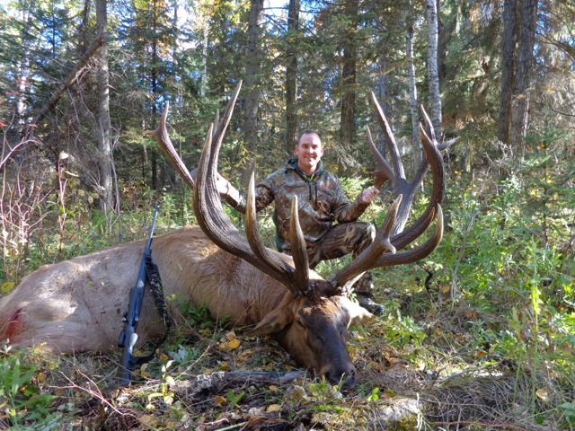 Jade Kirkland from Texas with trophy bull elk at Echo Lake Hunts in Saskatchewan