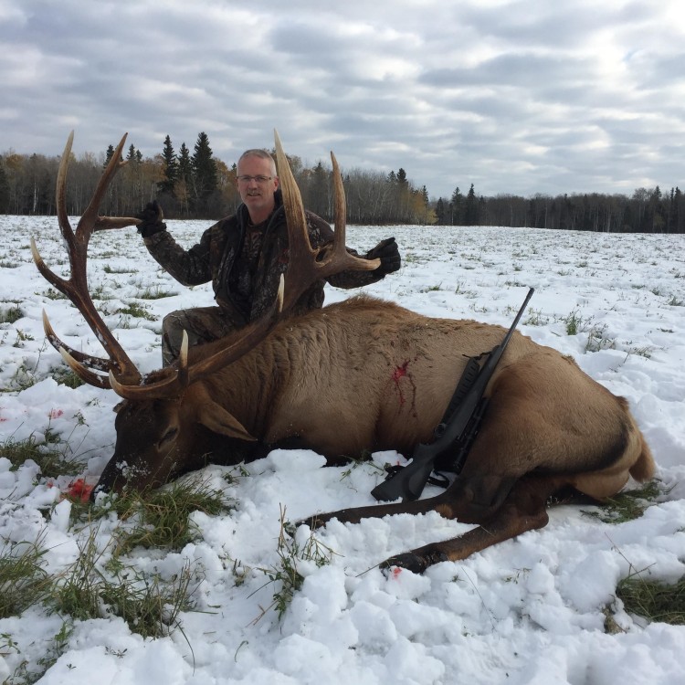 Barry Stone from Canada with trophy bull elk at Echo Lake Hunts in Saskatchewan