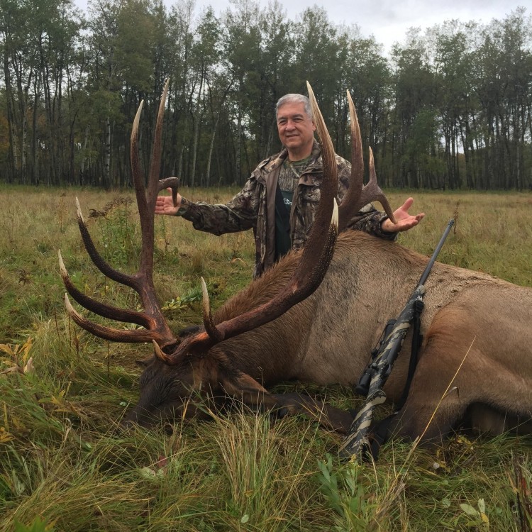 Henry Haina from Hawaii with trophy bull elk at Echo Lake Hunts in Saskatchewan