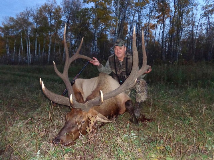 Lyle Degelman from Canada with trophy bull elk at Echo Lake Hunts in Saskatchewan