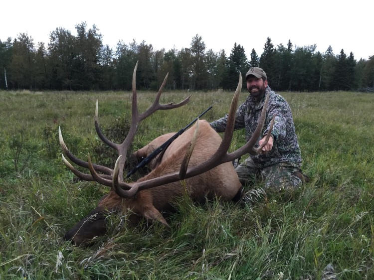 Mark Morren from Texas with trophy bull elk at Echo Lake Hunts in Saskatchewan