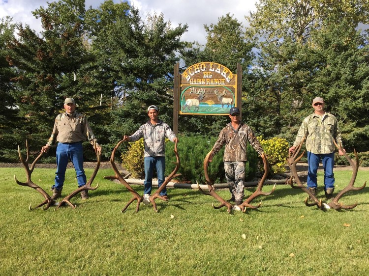 Another happy group after hunting elk in Saskatchewan Canada