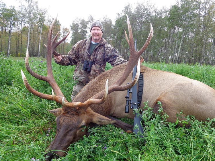 Todd Holland from Texas with trophy bull elk at Echo Lake Hunts in Saskatchewan