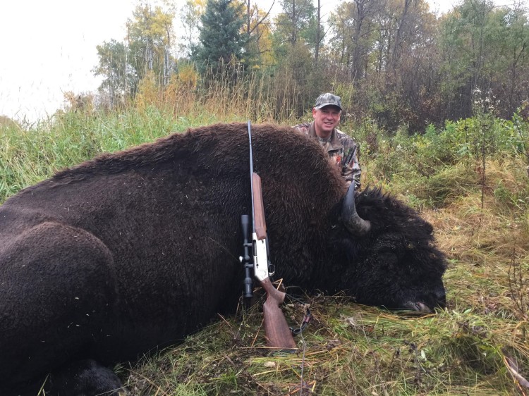 Wayne Smith from Canada with trophy bison at Echo Lake Hunts in Saskatchewan
