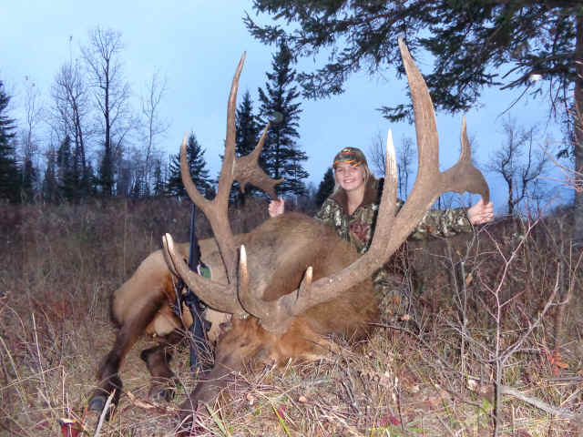 Ashley Challinor from Canada with trophy bull elk at Echo Lake Hunts in Saskatchewan