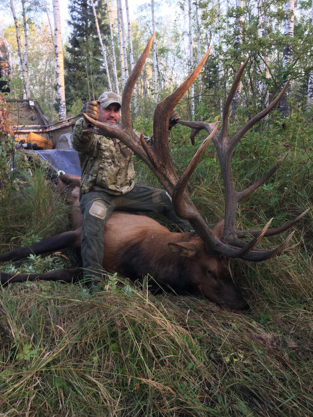 John Lewis from Texas with trophy bull elk at Echo Lake Hunts in Saskatchewan