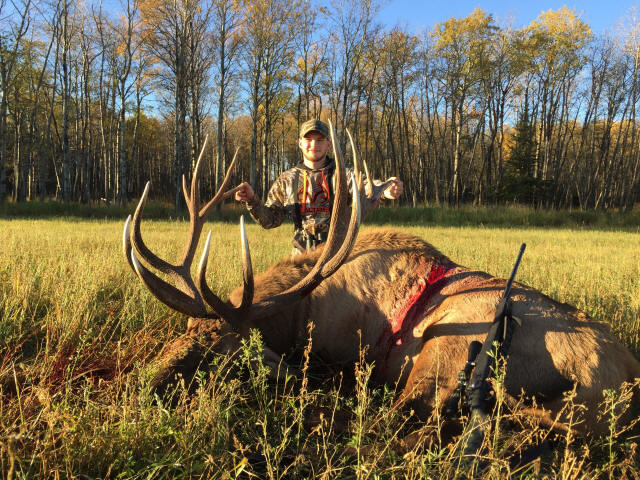 Sam Spears from Washington with trophy bull elk at Echo Lake Hunts in Saskatchewan