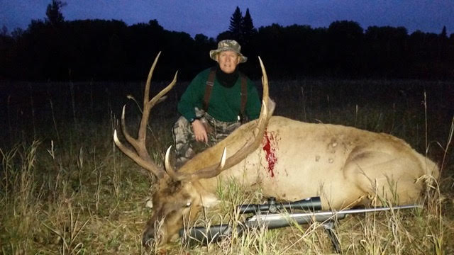 Karl Clinard from Kentucky with trophy bull elk at Echo Lake Hunts in Saskatchewan