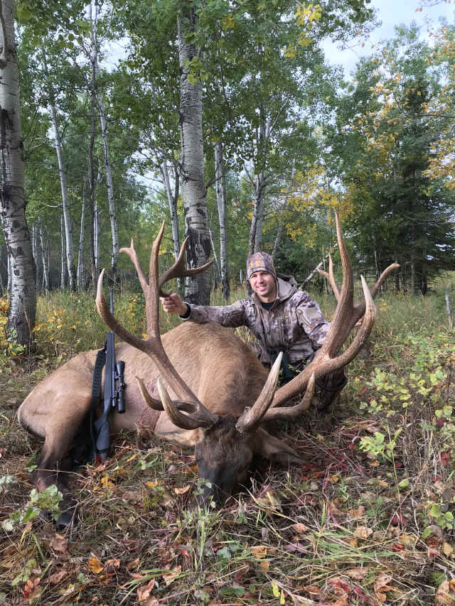Kevin Barretine from Texas with trophy bull elk at Echo Lake Hunts in Saskatchewan