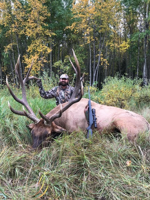 Mike Mayes Jr from Nebraska with trophy bull elk at Echo Lake Hunts in Saskatchewan