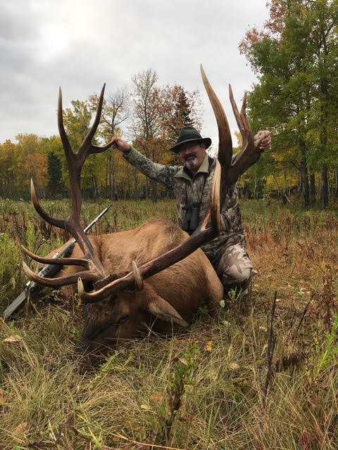 Tom Balzer from Canada with trophy bull elk at Echo Lake Hunts in Saskatchewan