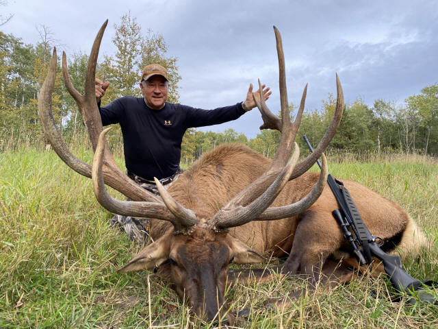 Arnie Burk from Arkansas with trophy bull elk at Echo Lake Hunts in Saskatchewan
