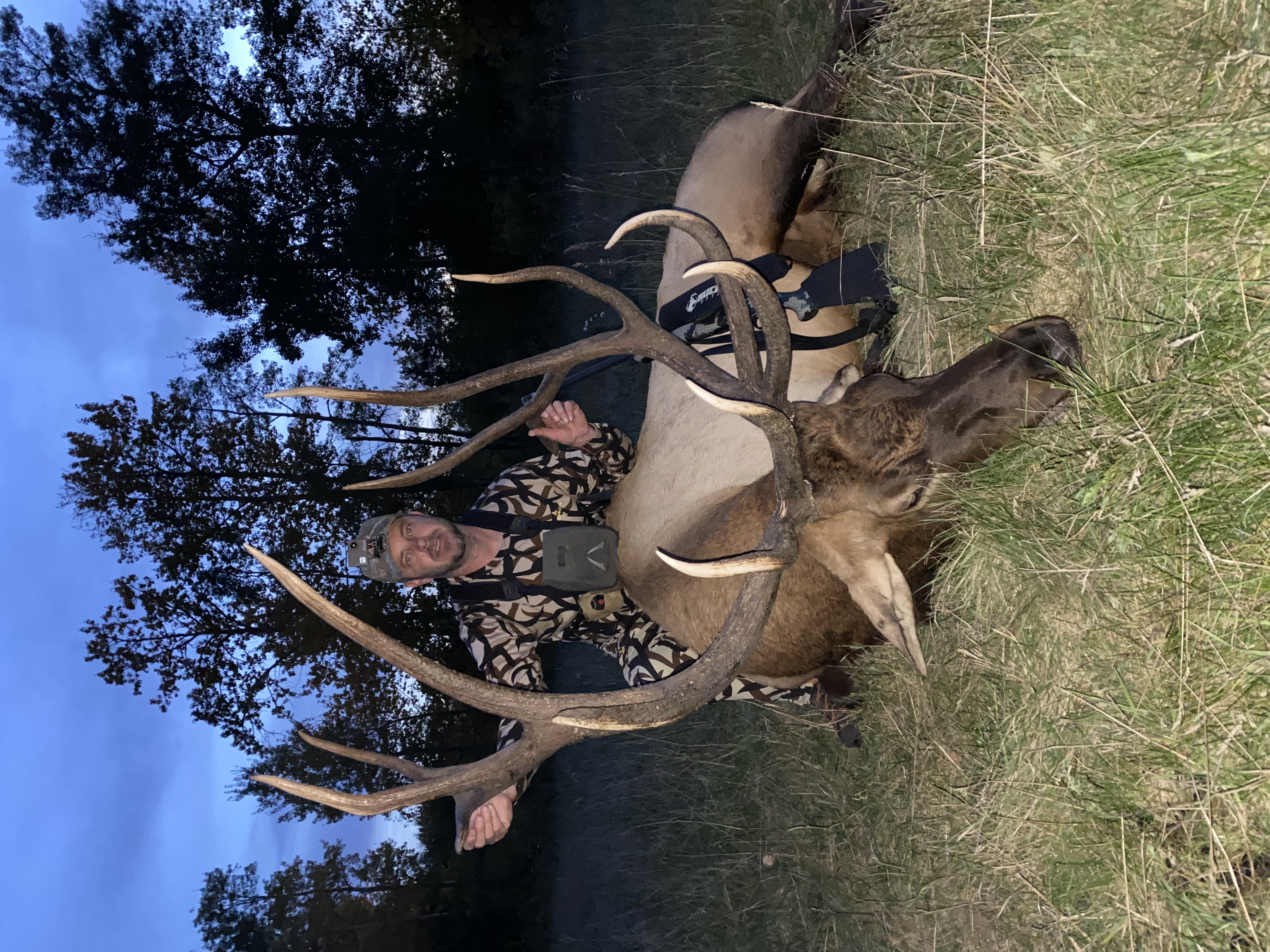Jake Maclurre from Oregon with trophy bull elk at Echo Lake Hunts in Saskatchewan