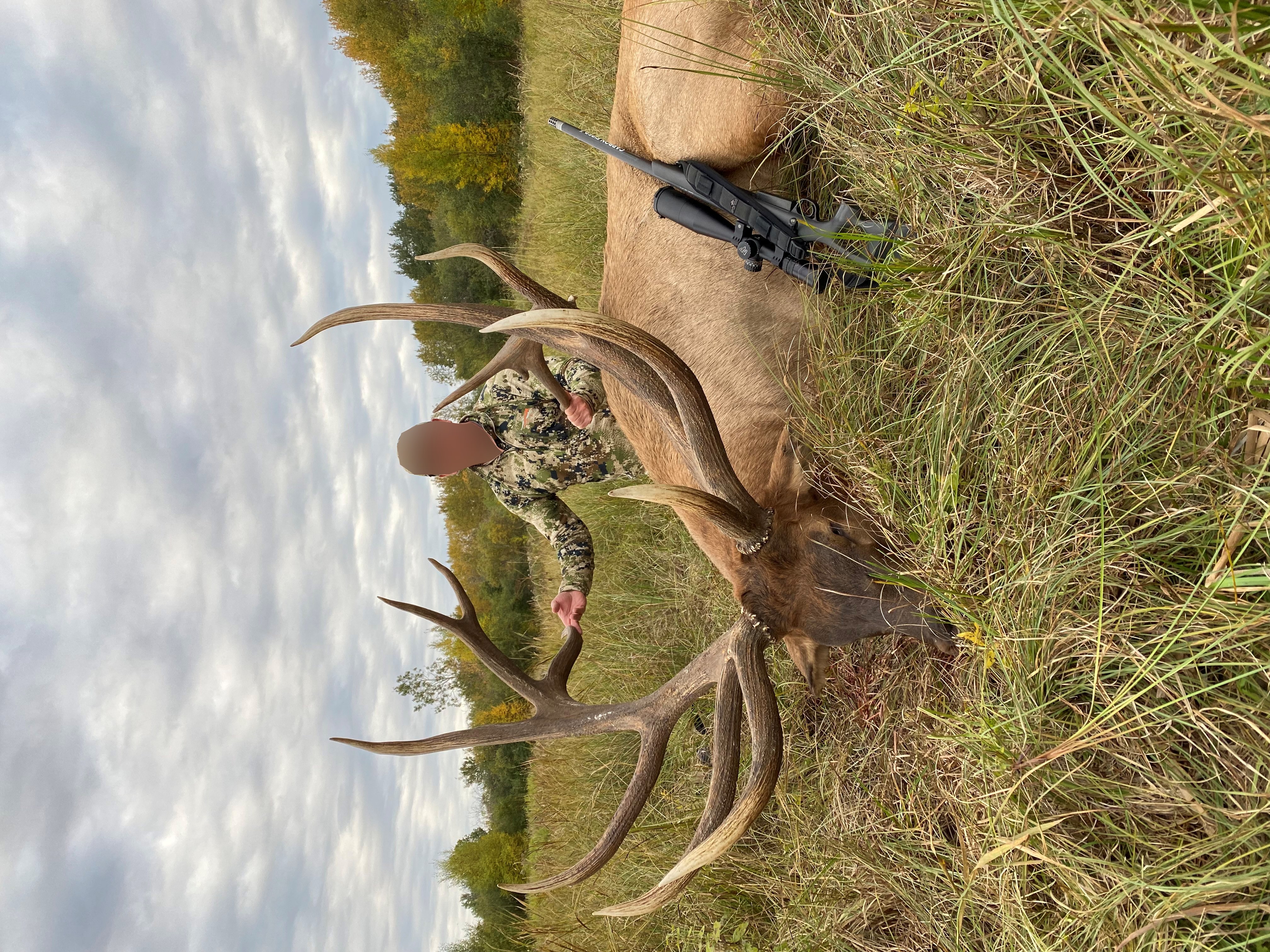 Hunter from North Dakota with trophy bull elk at Echo Lake Hunts in Saskatchewan