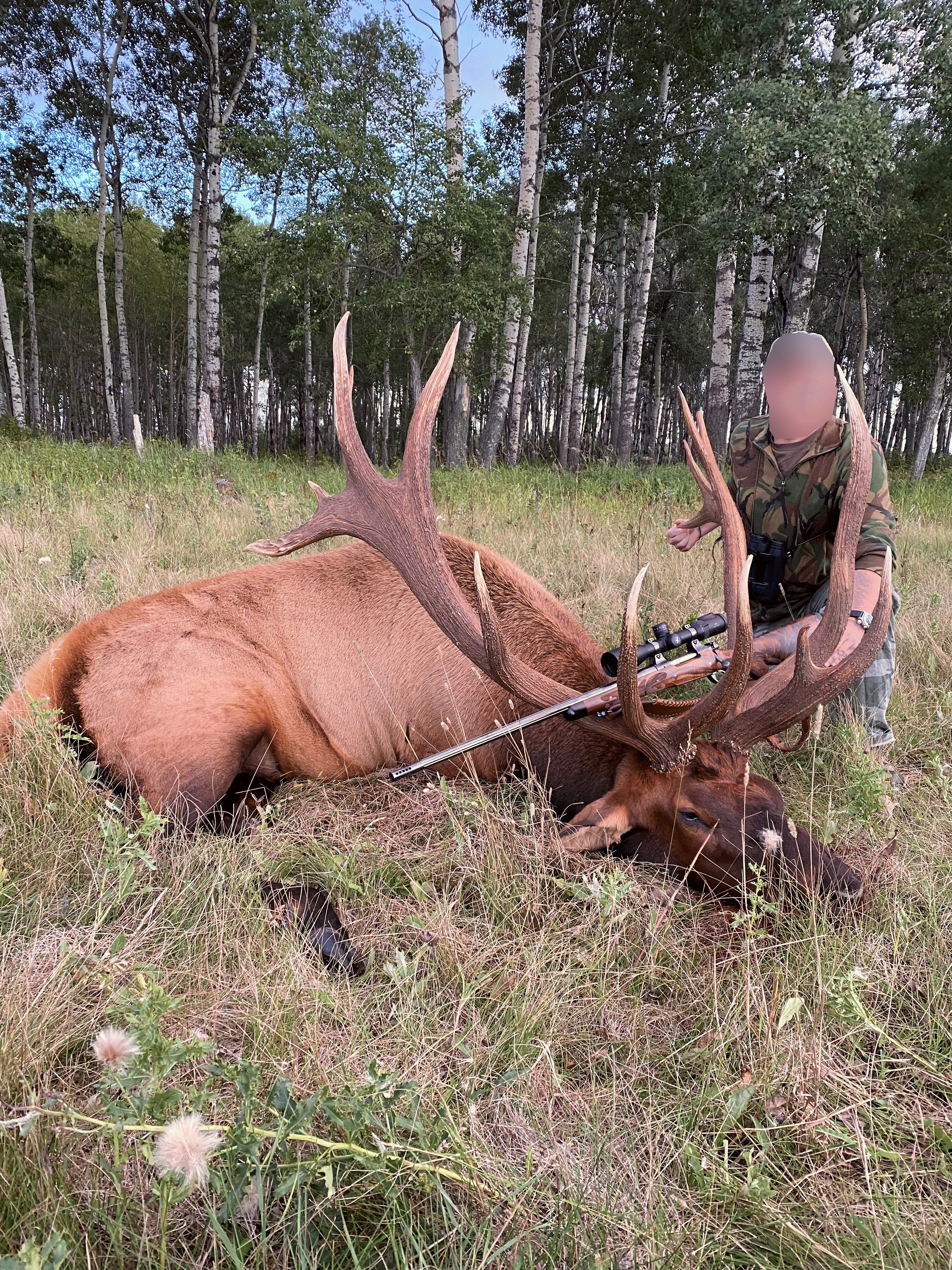 Hunter from North Dakota with trophy bull elk at Echo Lake Hunts in Saskatchewan