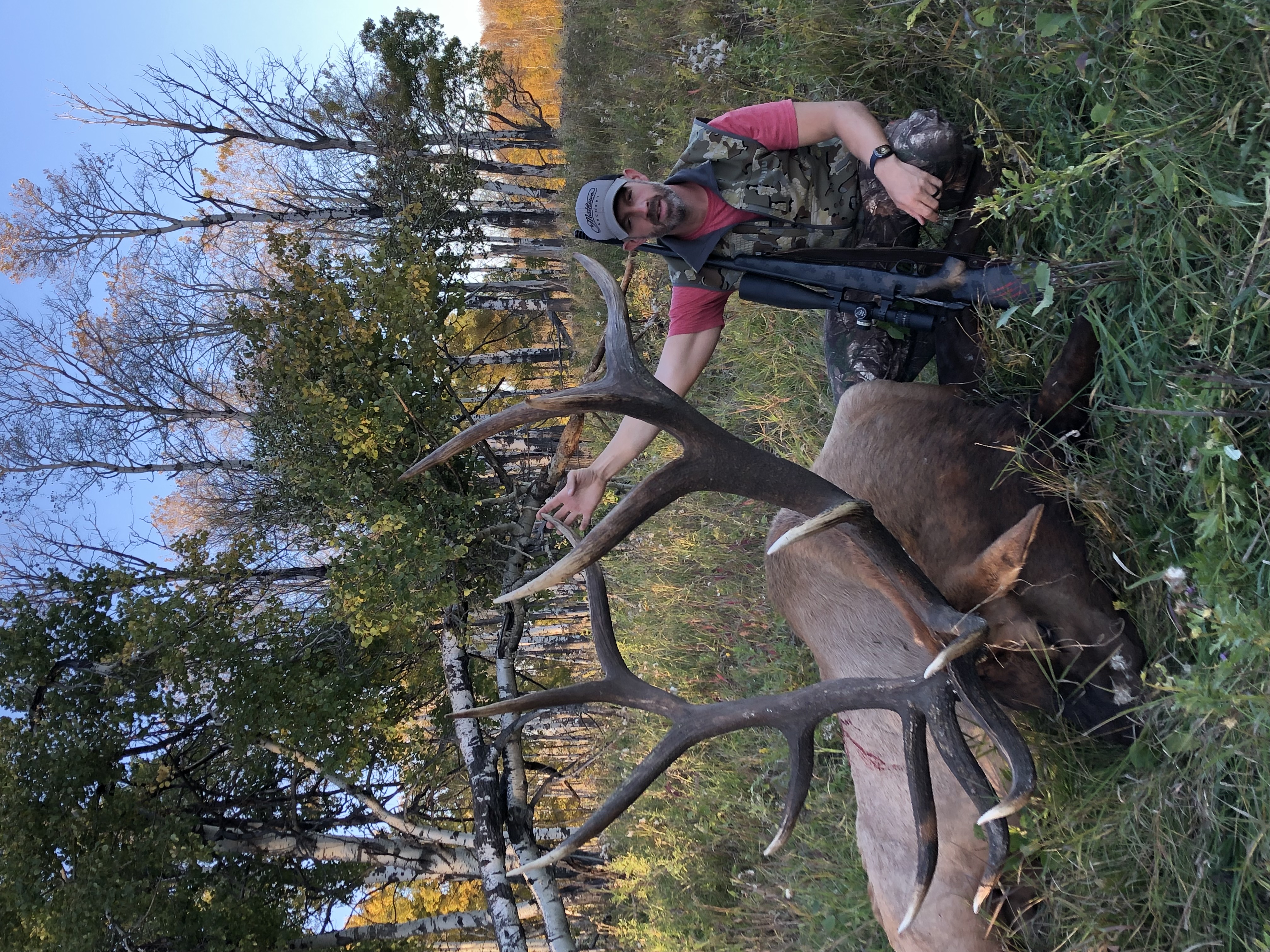 Tas Funk from Canada with trophy bull elk at Echo Lake Hunts in Saskatchewan