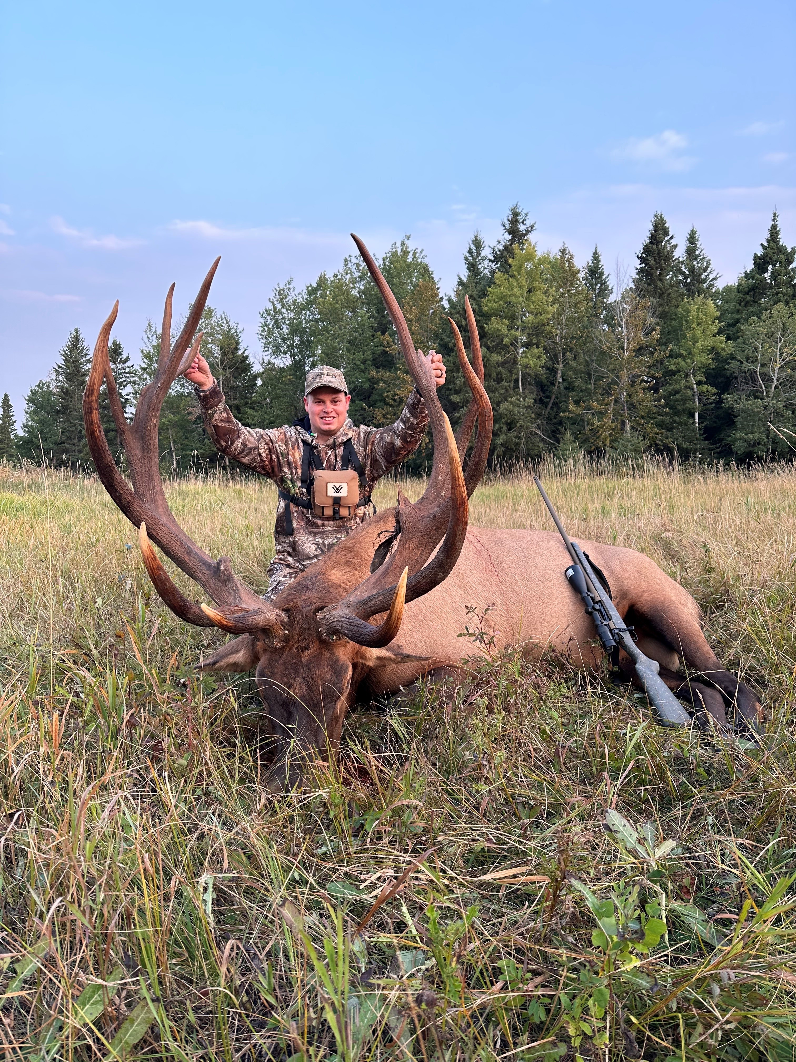 Sid Wiebe from Canada with trophy bull elk at Echo Lake Hunts in Saskatchewan