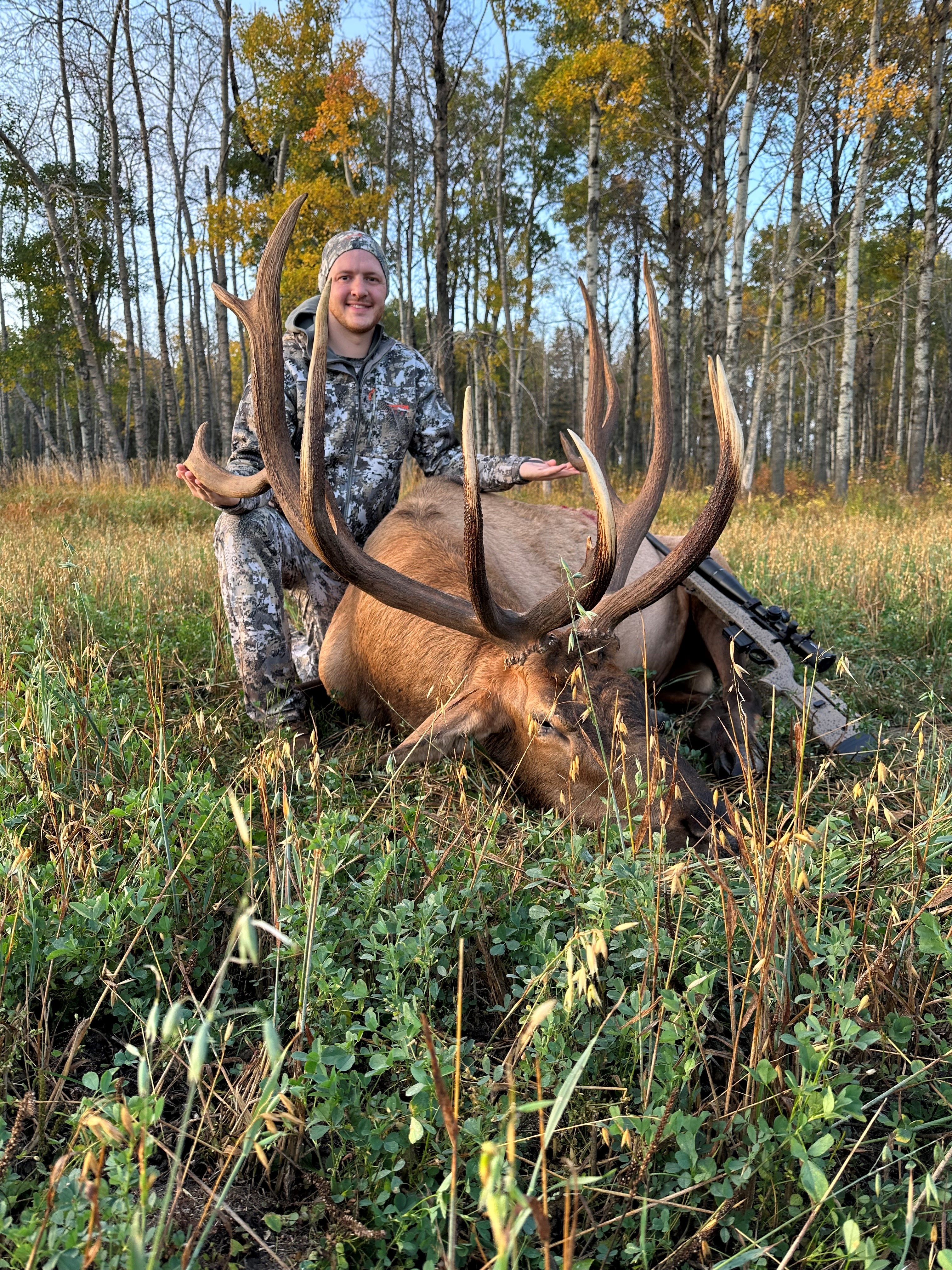Walker Thiele from Minnesota with trophy bull elk at Echo Lake Hunts in Saskatchewan