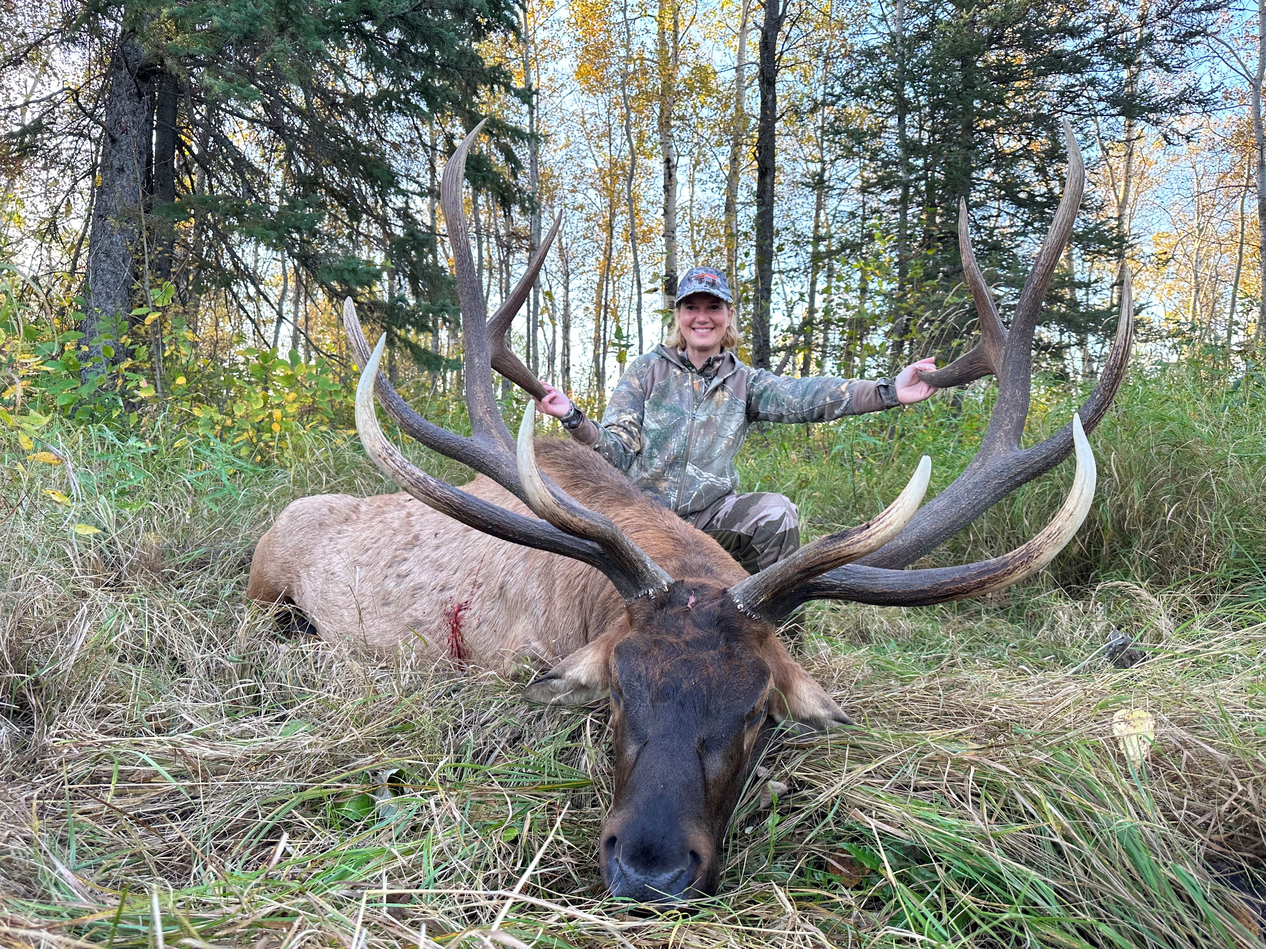 Amber Olson from Florida with trophy bull elk at Echo Lake Hunts in Saskatchewan