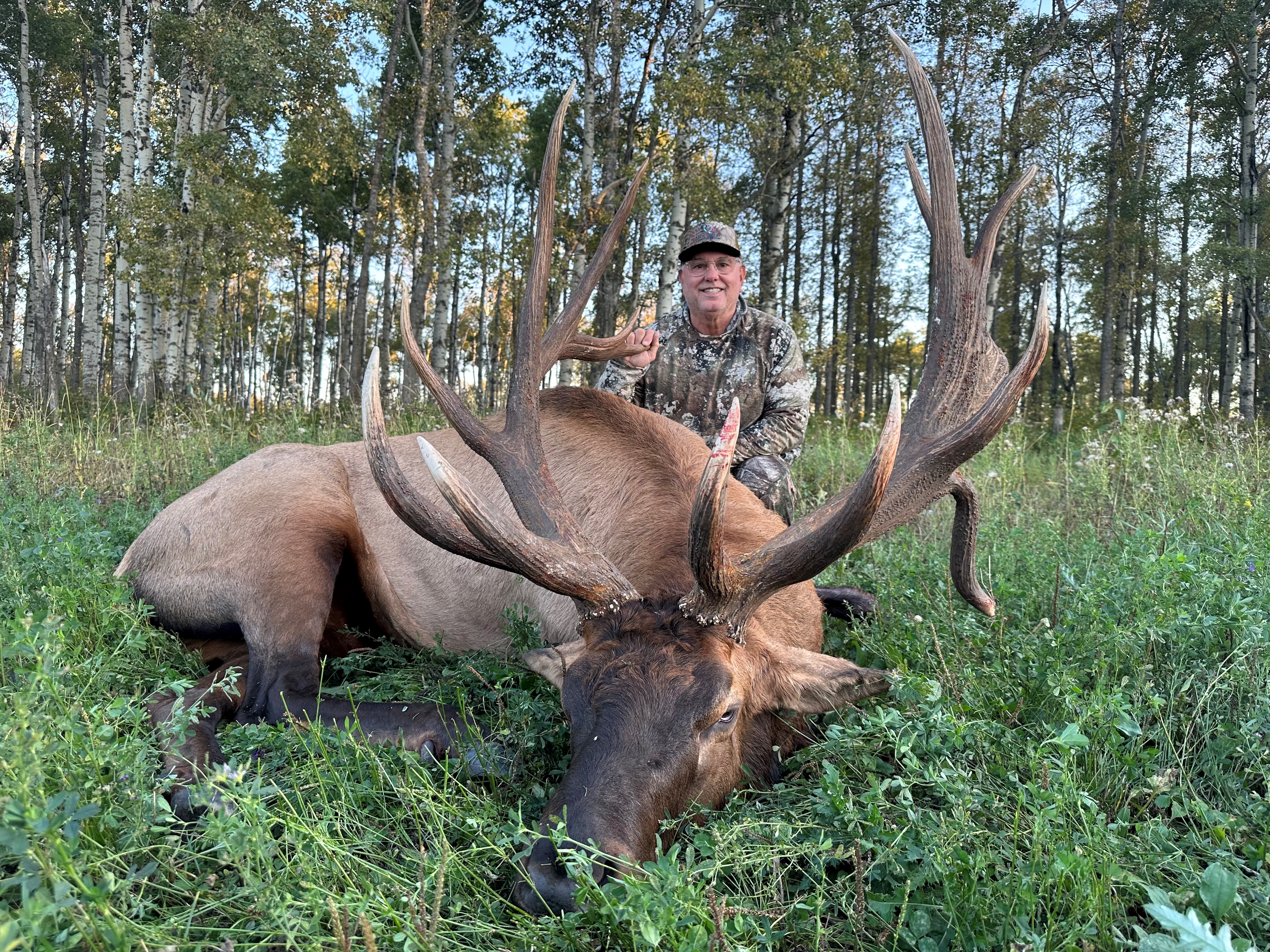 Bob Pellergrin from Louisiana with trophy bull elk at Echo Lake Hunts in Saskatchewan