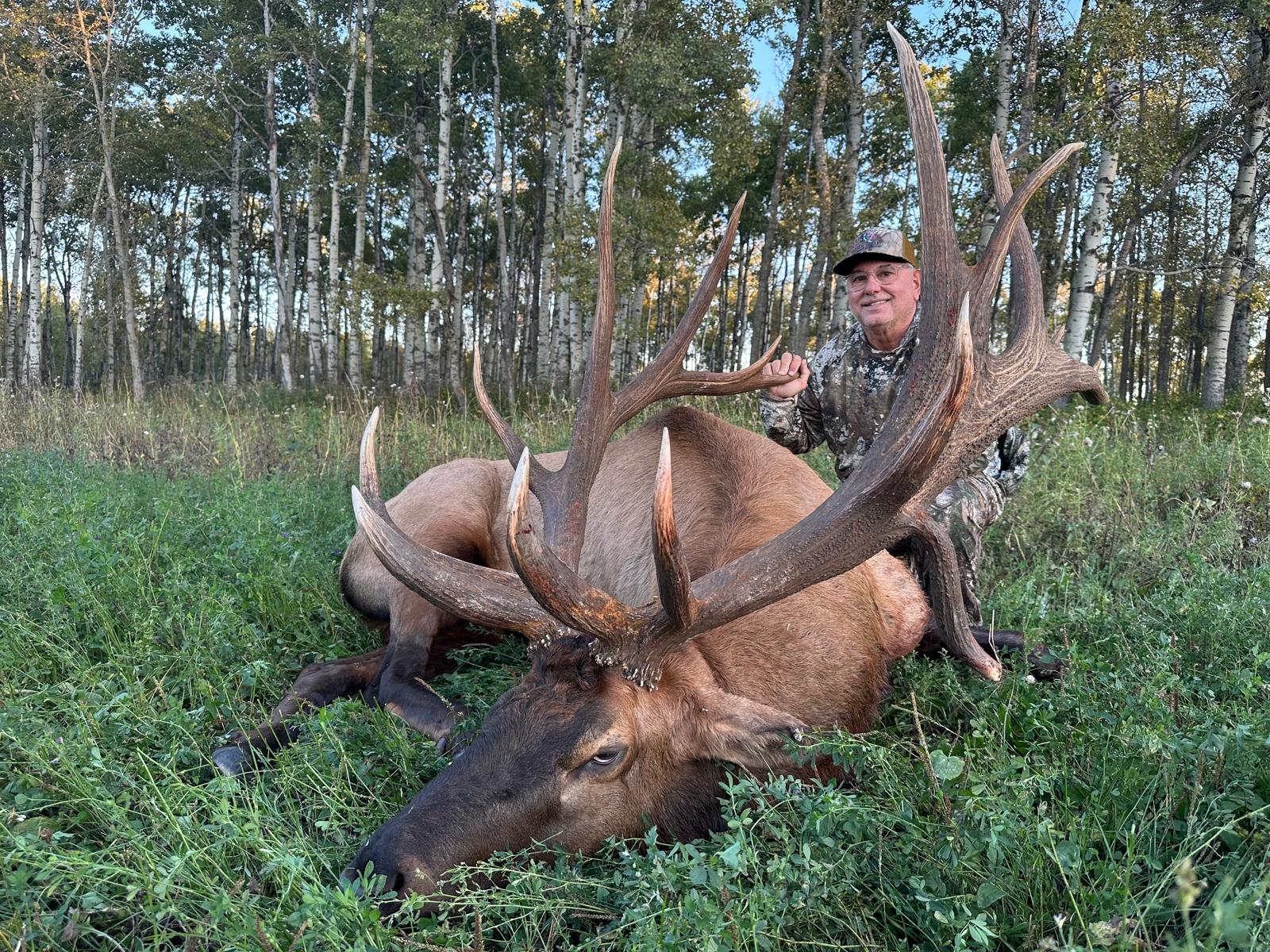 Bob Pellergrin from Louisiana with trophy bull elk at Echo Lake Hunts in Saskatchewan