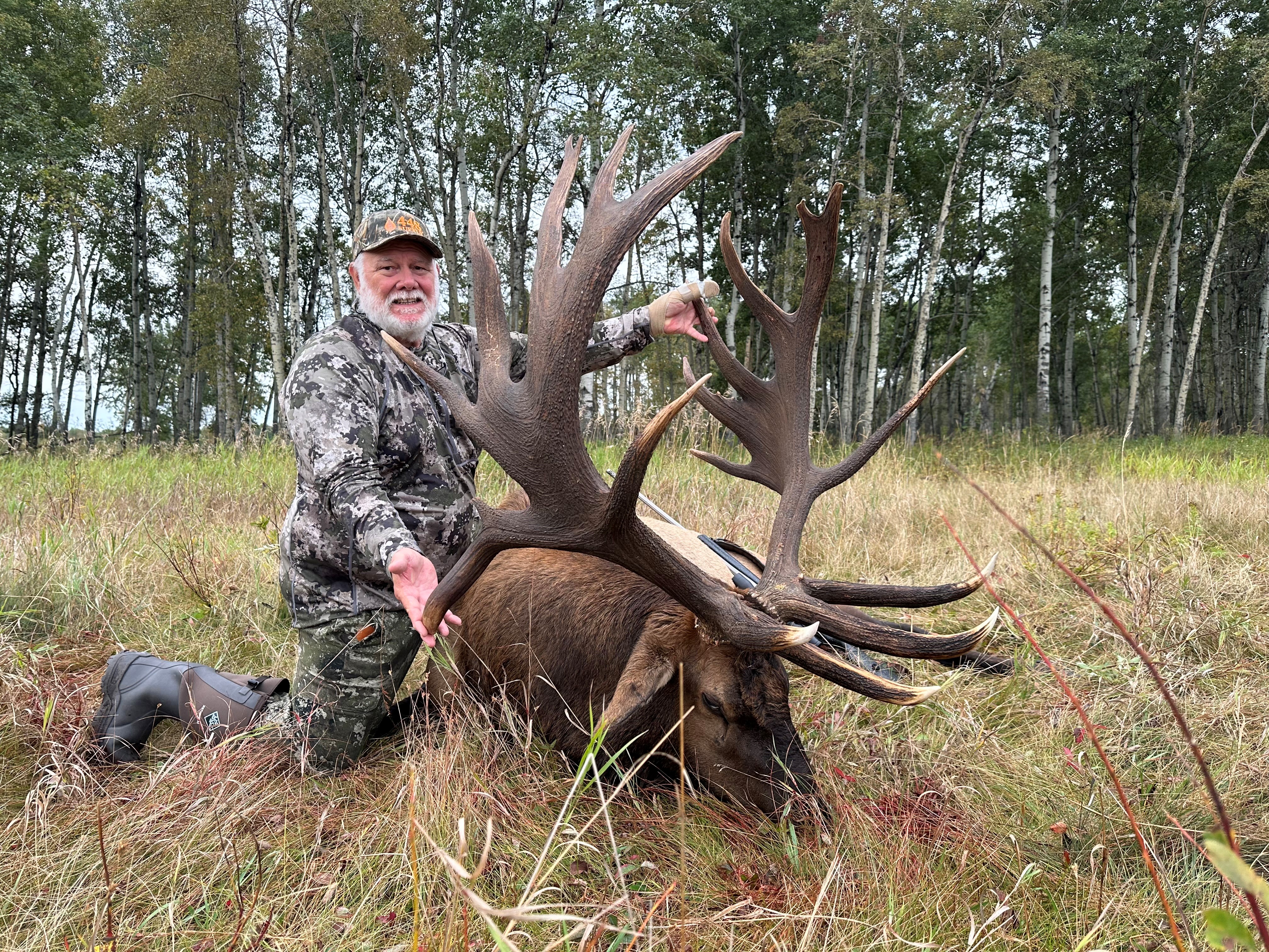 Bruce Krueger from Texas with trophy bull elk at Echo Lake Hunts in Saskatchewan