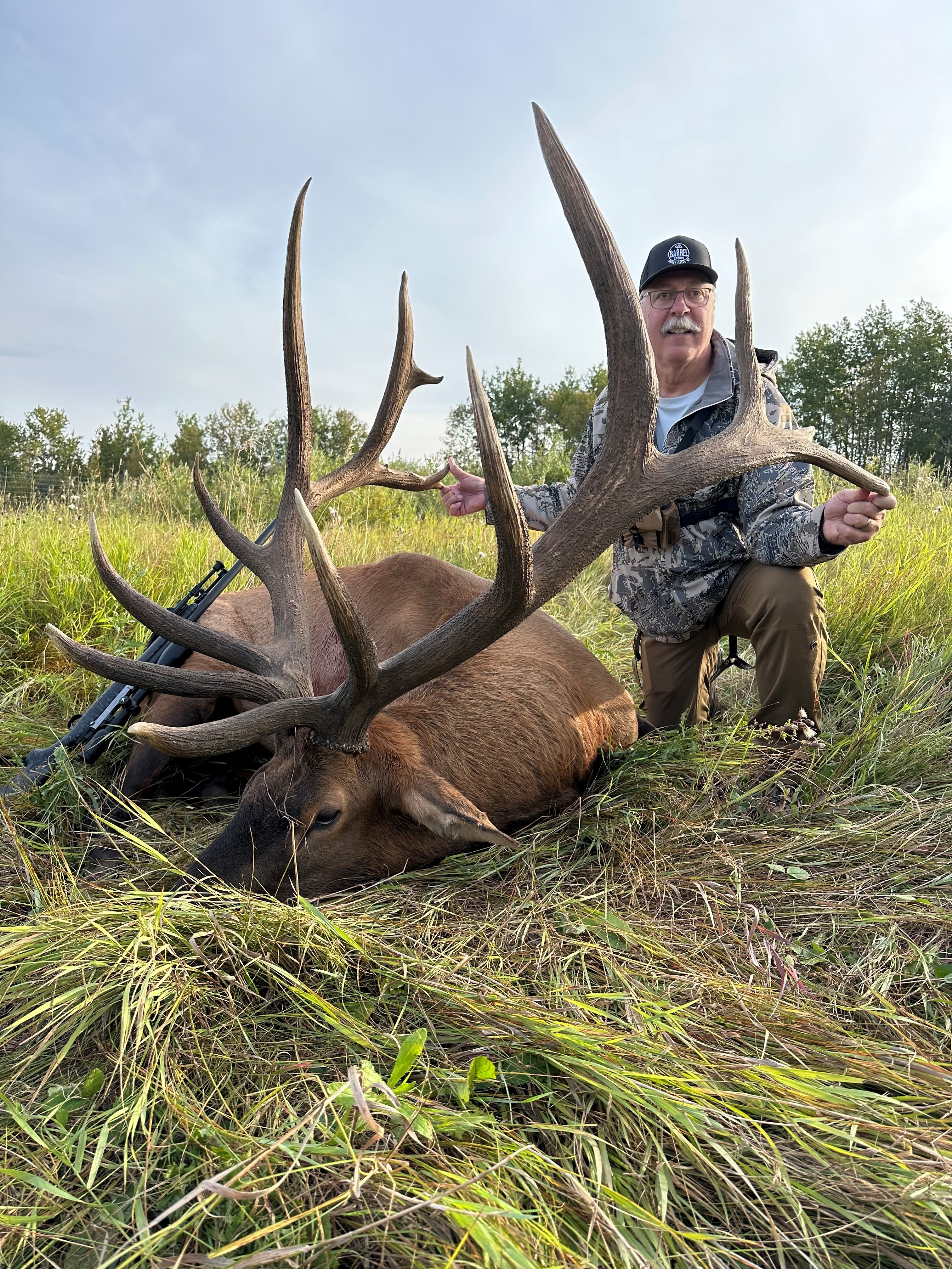 Chuck Dietz from Montana with trophy bull elk at Echo Lake Hunts in Saskatchewan