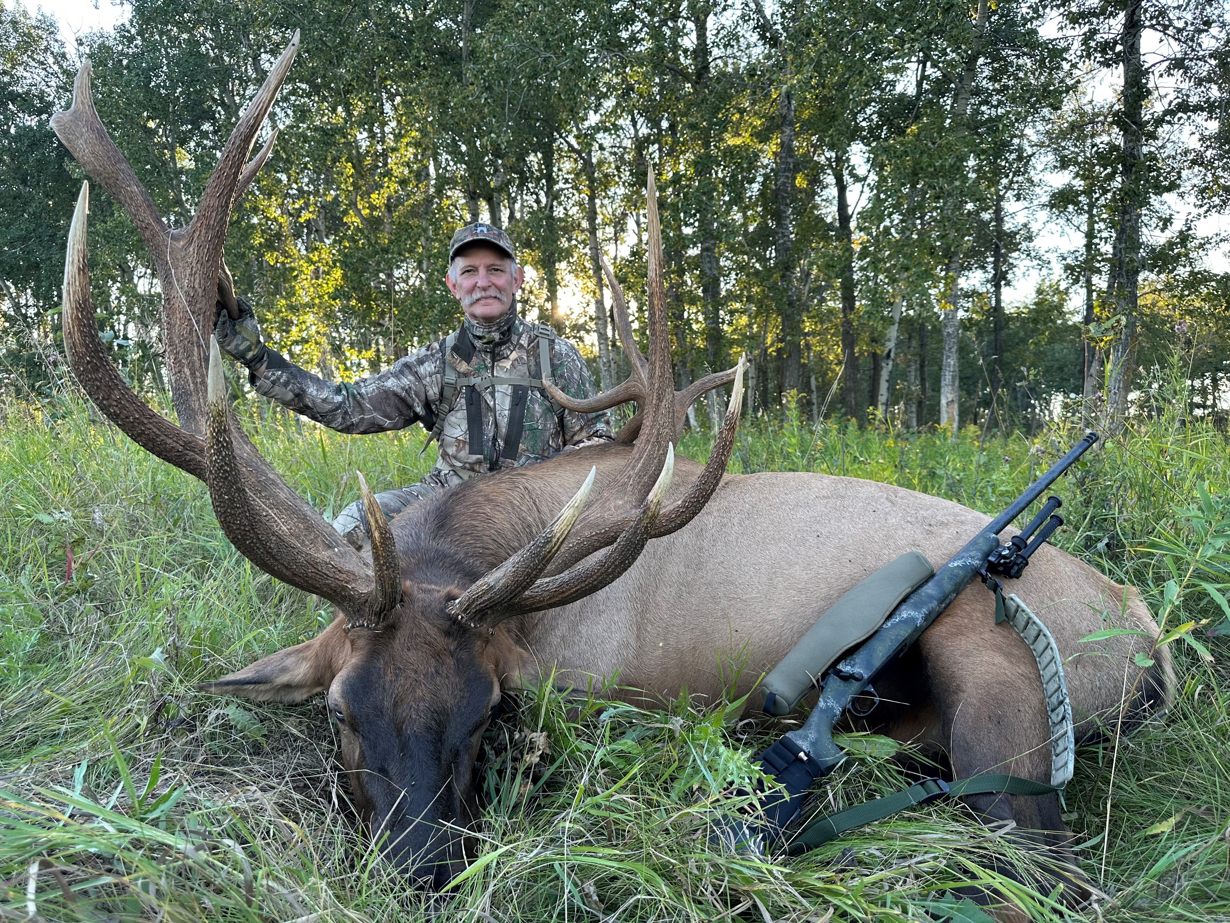 Joe Berger from Georgia with trophy bull elk at Echo Lake Hunts in Saskatchewan